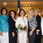 Barbara VanKirk and IQ employees at the Winners' Circle Luncheon.